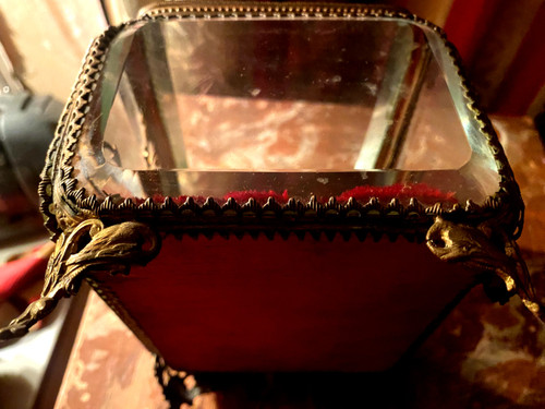 Large Napoleon III period beveled crystal jewelry box with chased bronze frame on all sides.