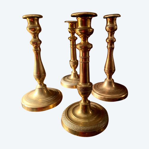 Two pairs of elegant Restoration-period polished bronze guilloche candlesticks