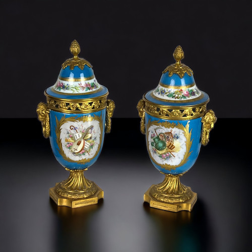 PAIR OF COVERED POTS IN SÈVRES PORCELAIN DECORATED WITH GILT BRONZE NAPOLEON III