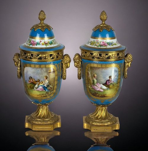 PAIR OF COVERED POTS IN SÈVRES PORCELAIN DECORATED WITH GILT BRONZE NAPOLEON III