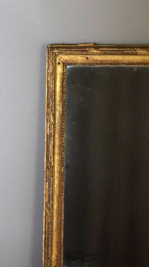 Grand miroir en bois doré fin XVIII début XIX