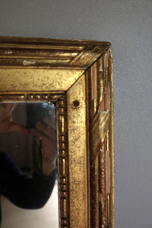 Grand miroir en bois doré fin XVIII début XIX