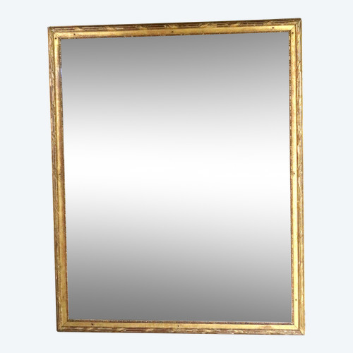 Grand miroir en bois doré fin XVIII début XIX
