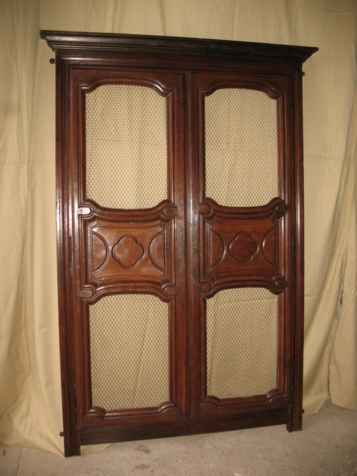 Facade of woodwork or library doors in walnut, late 18th century, Louis XIV style