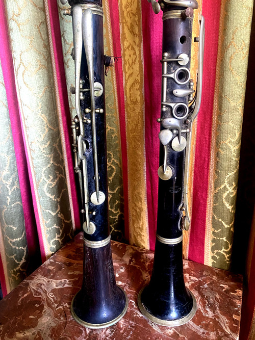  Bellissima coppia di clarinetti di fine '800 in palissandro scuro e bronzo nichelato di buona qualità