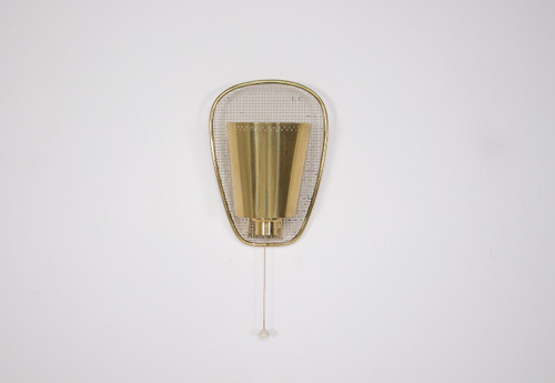 Wandleuchte aus perforiertem Messing im Jacques Biny-Stil.
