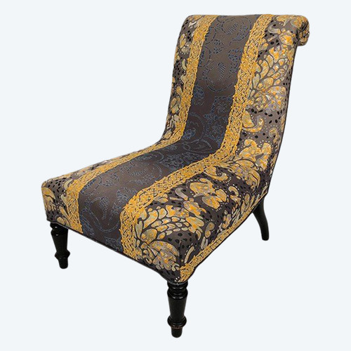 Low chair with moving backrest, blackened wooden legs. Napoleon III period