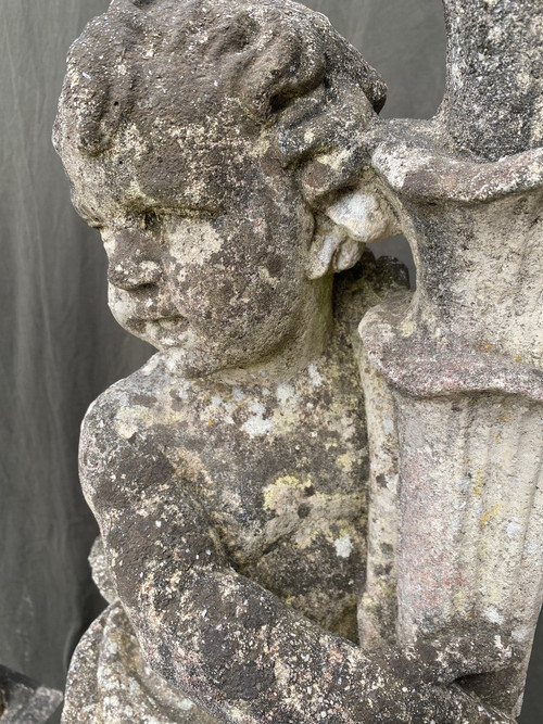 Putti (coppia) Su Base In Pietra Ricostituita XX Secolo