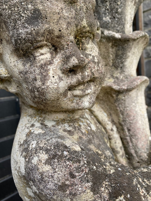 Putti (coppia) Su Base In Pietra Ricostituita XX Secolo