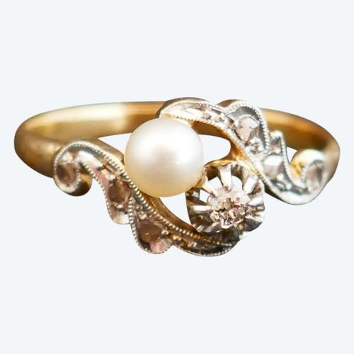 Anello con diamanti e perle.