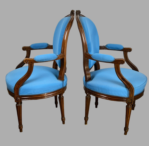 PAIR OF 18th CENTURY ARMCHAIRS FROM LOUIS XVI PERIOD IN CARVED MOLDED/UPPHONED WALNUT