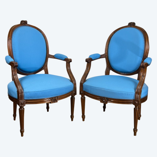 PAIR OF 18th CENTURY ARMCHAIRS FROM LOUIS XVI PERIOD IN CARVED MOLDED/UPPHONED WALNUT