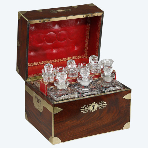 FLAMED MAHOGANY LIQUEUR CELLAR WITH CUT CRYSTAL BOTTLES AND GLASSES