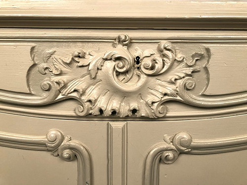 Low rocaille style sideboard in cream lacquered wood, circa 1900