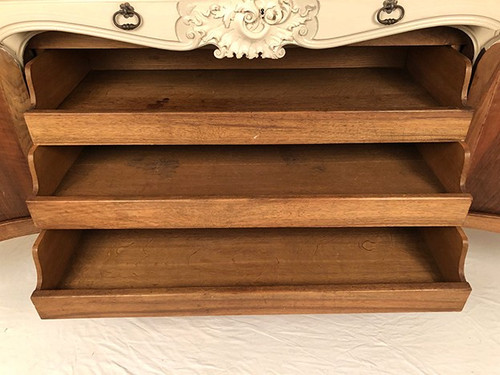 Low rocaille style sideboard in cream lacquered wood, circa 1900