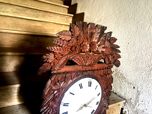 Richly carved in pine this lady's clock window from Upper Normandy, Cauchoise 18th