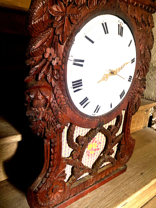 Richly carved in pine this lady's clock window from Upper Normandy, Cauchoise 18th