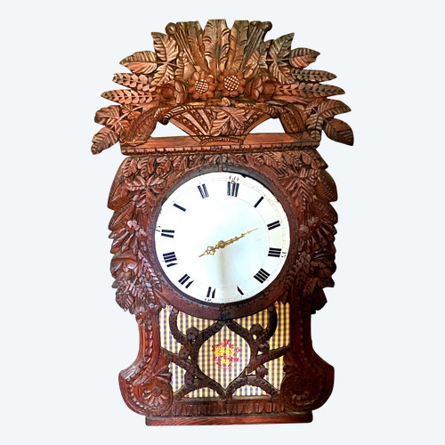 Richly carved in pine this lady's clock window from Upper Normandy, Cauchoise 18th