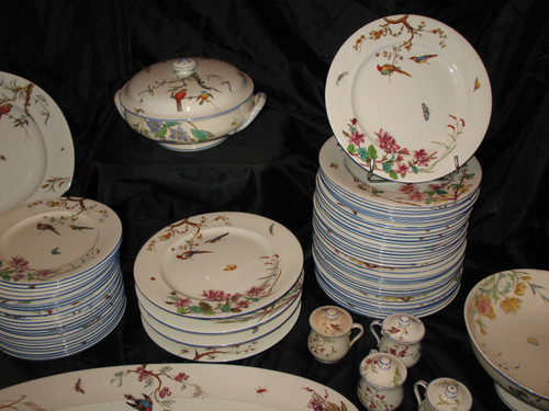 Table service in fine earthenware from Bordeaux, Nella decor with flowers and birds, 19th century