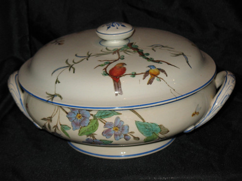 Table service in fine earthenware from Bordeaux, Nella decor with flowers and birds, 19th century