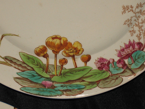 Table service in fine earthenware from Bordeaux, Nella decor with flowers and birds, 19th century