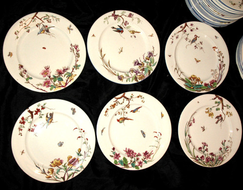 Table service in fine earthenware from Bordeaux, Nella decor with flowers and birds, 19th century