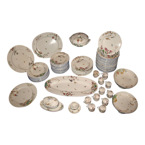 Table service in fine earthenware from Bordeaux, Nella decor with flowers and birds, 19th century