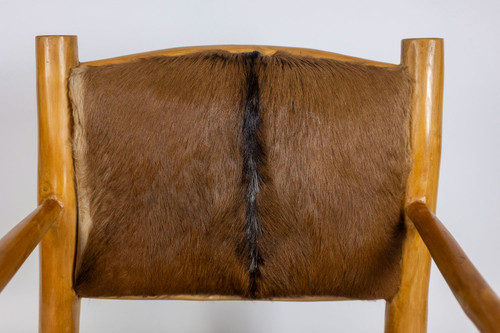 Brutalist armchair in elm and goatskin, 1970s
