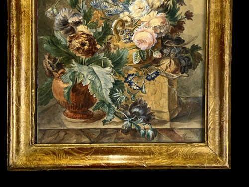 XVIIIth CENTURY FRAME IN SCULPTTED AND GILDED WOOD AND XVIIIth CENTURY AQUARELLE WITH SIGNED FLORAL DECOR