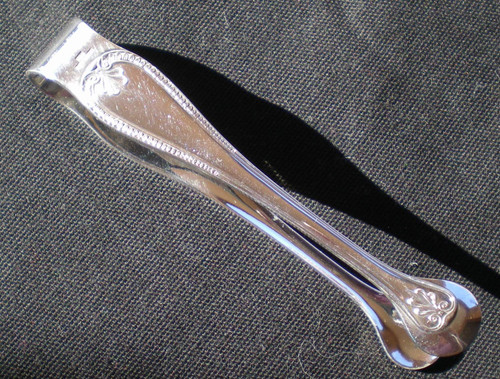 Pretty sugar tongs in silver metal model "Malmaison" Christofle goldsmith