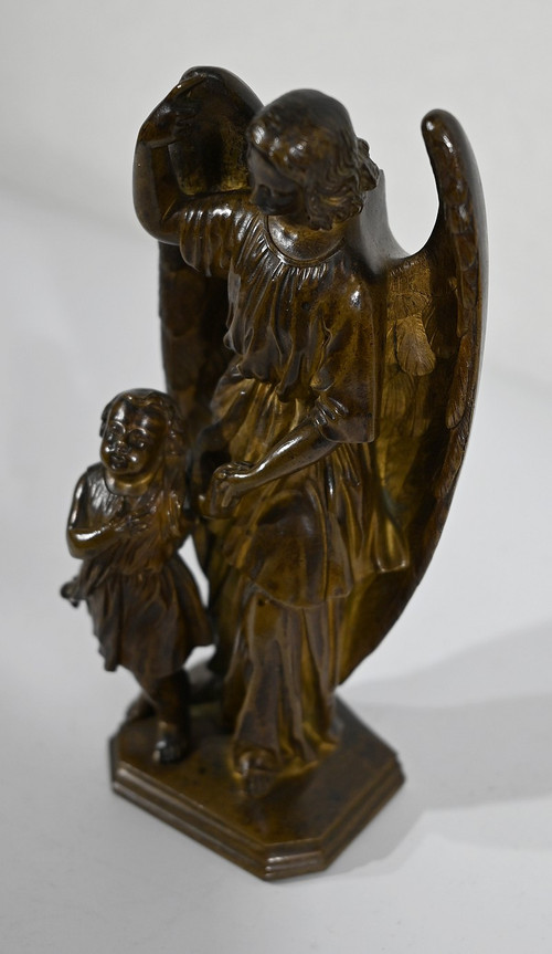 Bronzo patinato, “Bambino condotto da un angelo” – 1900
