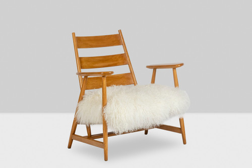 Pair of “lounge” armchairs in blond beech. 1950s