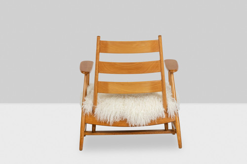 Pair of “lounge” armchairs in blond beech. 1950s