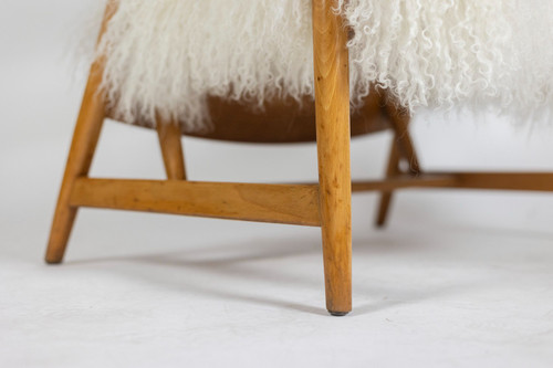 Pair of “lounge” armchairs in blond beech. 1950s