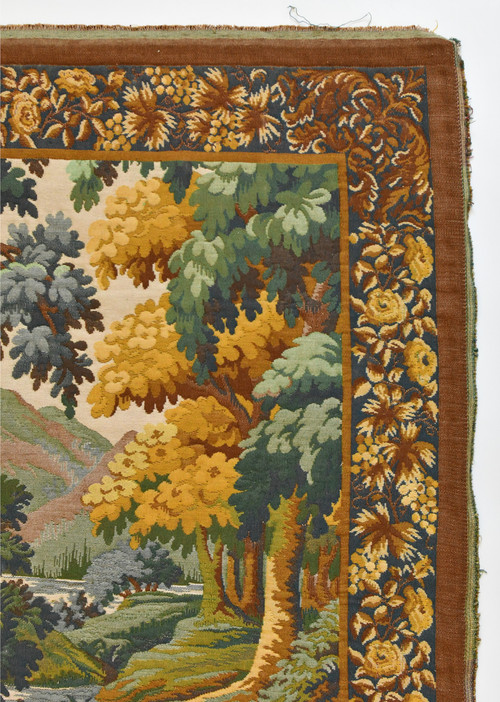 Tapestry depicting a green landscape