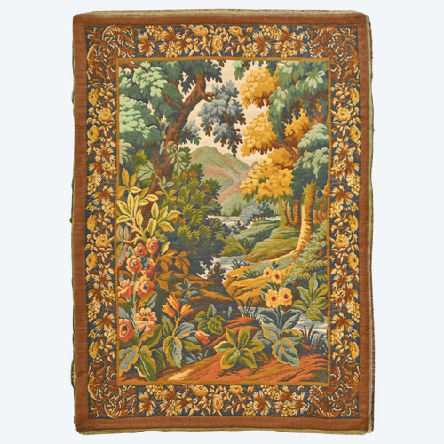 Tapestry depicting a green landscape
