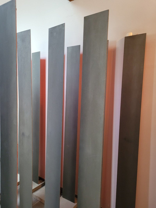 A Pirri, Installazione "Cure", Doghe in acciaio su basi in cemento, XX Secolo