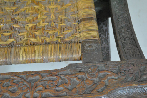 Sedia pieghevole in legno esotico intagliato e canna, Asia, Fine XIX/Inizio XX secolo