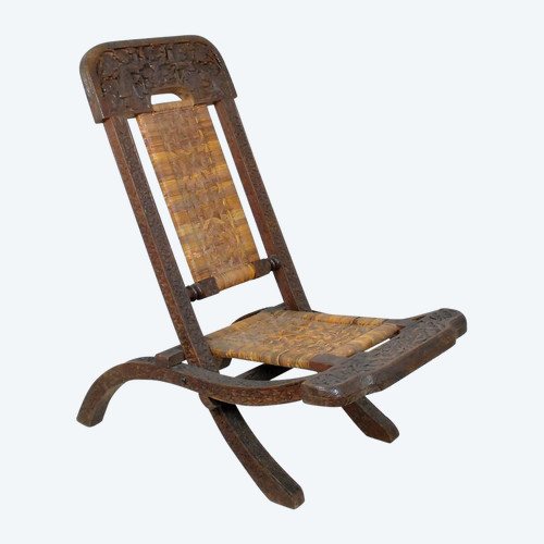 Sedia pieghevole in legno esotico intagliato e canna, Asia, Fine XIX/Inizio XX secolo