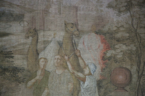 Grande toile peinte du XVIIIe, "la halte d'une caravane à un puits"