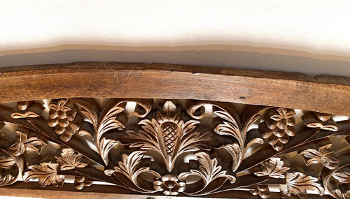 Boiserie. Haut de porte début XXème. Bois sculpté. Décor fleurs et fruits.