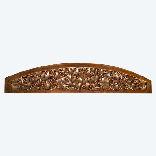 Boiserie. Haut de porte début XXème. Bois sculpté. Décor fleurs et fruits.
