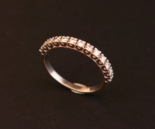 Halbdiamant-Ehering, 18 Karat Weißgold.
