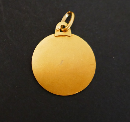 18 Carat Gold Virgin Medal.