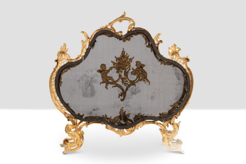 Pare-feu en bronze doré de style Louis XV. Circa 1880.