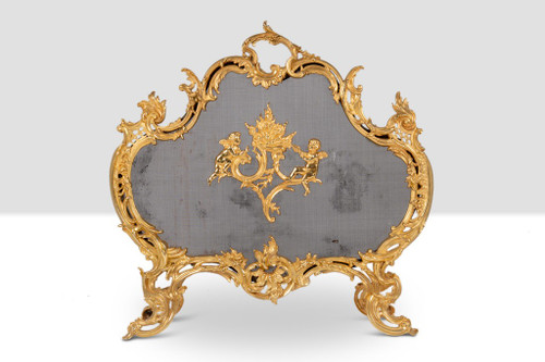 Pare-feu en bronze doré de style Louis XV. Circa 1880.