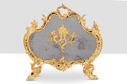 Pare-feu en bronze doré de style Louis XV. Circa 1880.