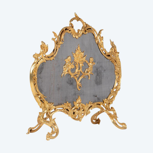 Pare-feu en bronze doré de style Louis XV. Circa 1880.