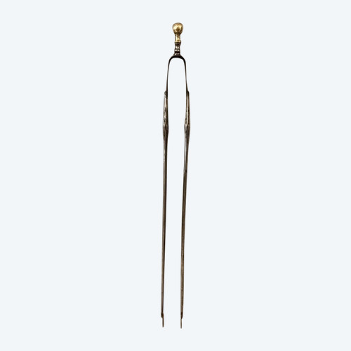 Beautiful antique iron and brass mantel clamp from the 19th Empire period