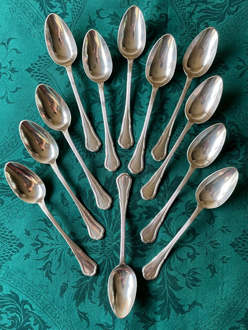 12 dessert spoons.